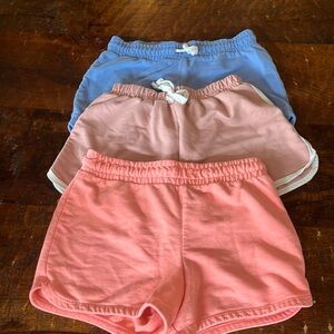 Three pairs girls athletic shorts
